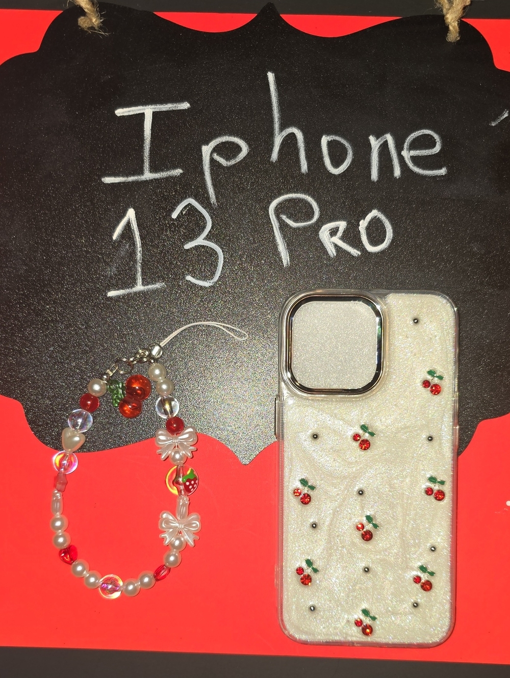Apple iPhone 13 Pro White Glitter Case with Red Cherry Accents and Beaded Charm